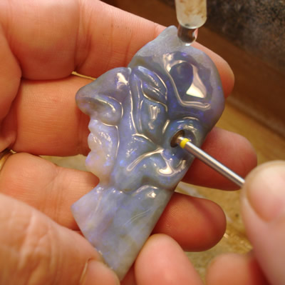 Helen carving black opal